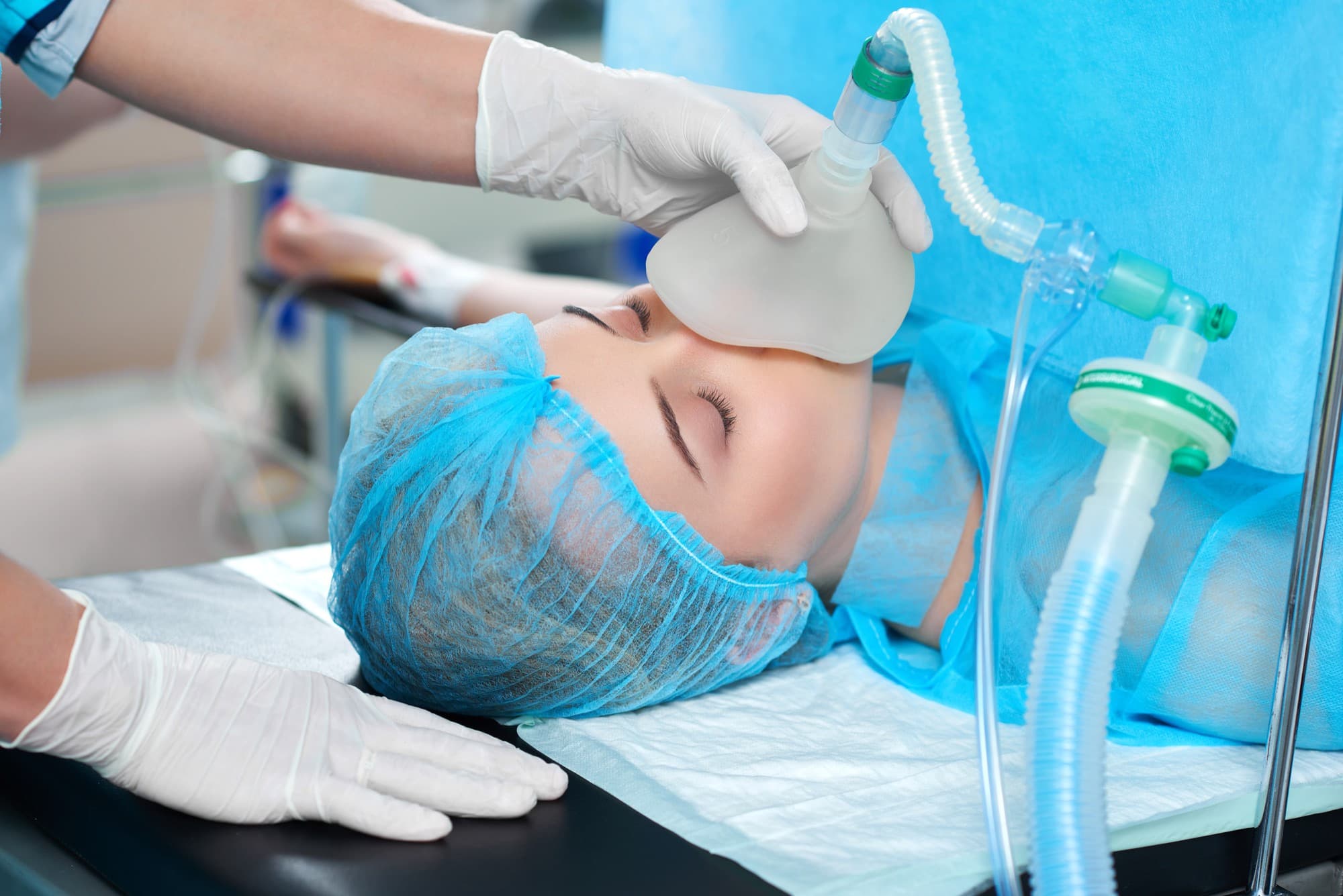 Patient under sedation with mask