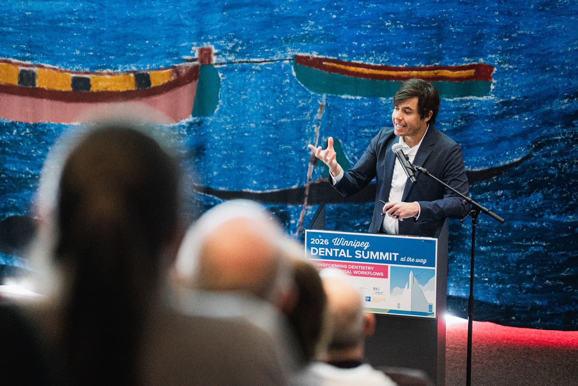 Dr. Luciano Retana speaking at Winnipeg Dental Summit, Canada